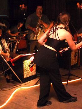 Jane grooving in front of the band