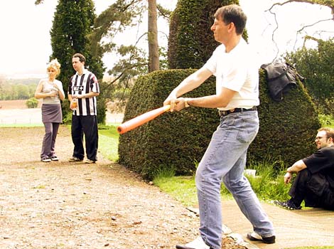 Malcolm playing baseball