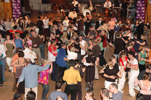 Overseas visitors dance