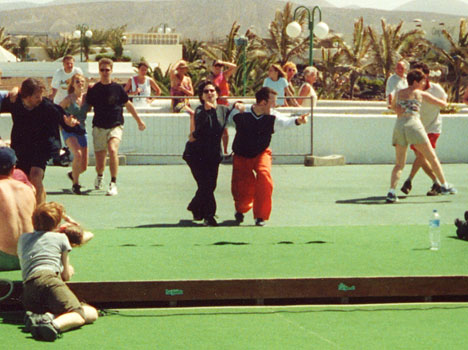 Dan & Christi teaching Lindy Hop on the lawn.