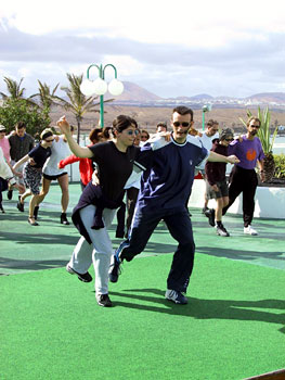 Dan and Christi teaching on the lawn
